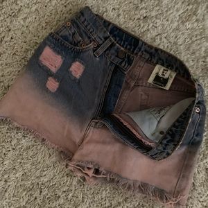 Vintage Levi’s high waisted shorts. Pink dip dye!